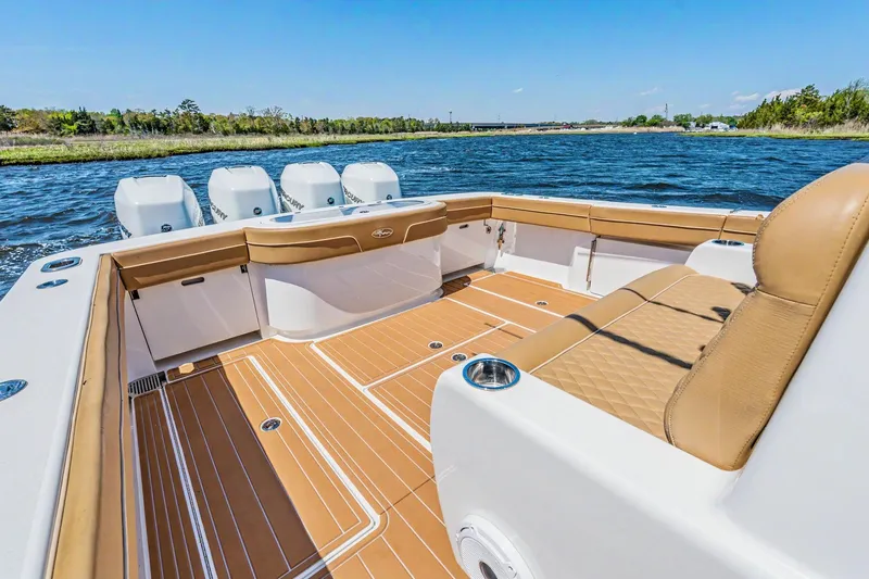 Slide: The Image of 2021 Valhalla Boatworks V-41 with luxurious deck and seating on open water. - 22