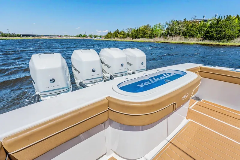 Slide: The Image of 2021 Valhalla Boatworks V-41 with four Mercury engines on a sunny day. - 25