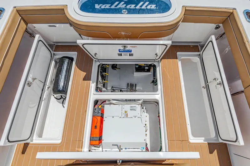 Slide: The Image of 2021 Valhalla Boatworks V-41 engine compartment with open hatches and visible equipment. - 27