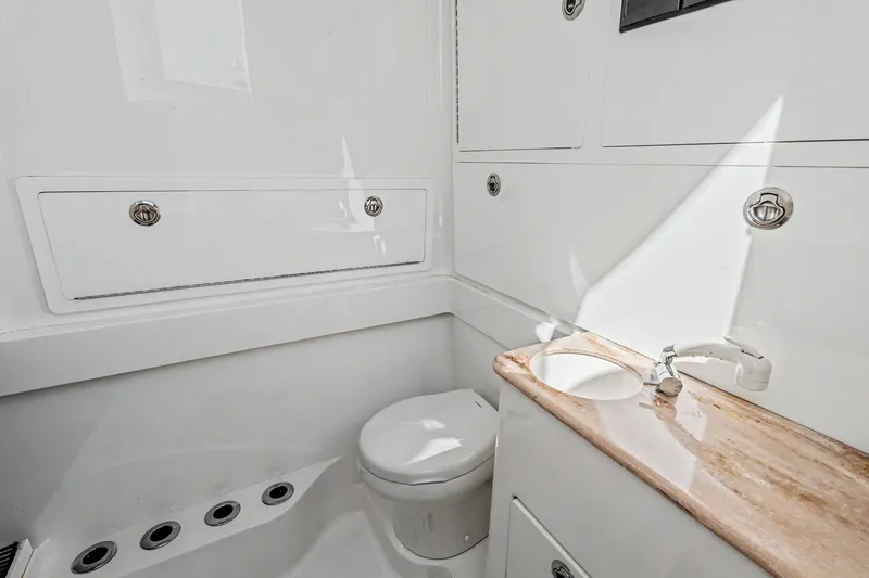 Slide: The Image of 2021 Valhalla Boatworks V-41 interior bathroom with sink and toilet. - 29