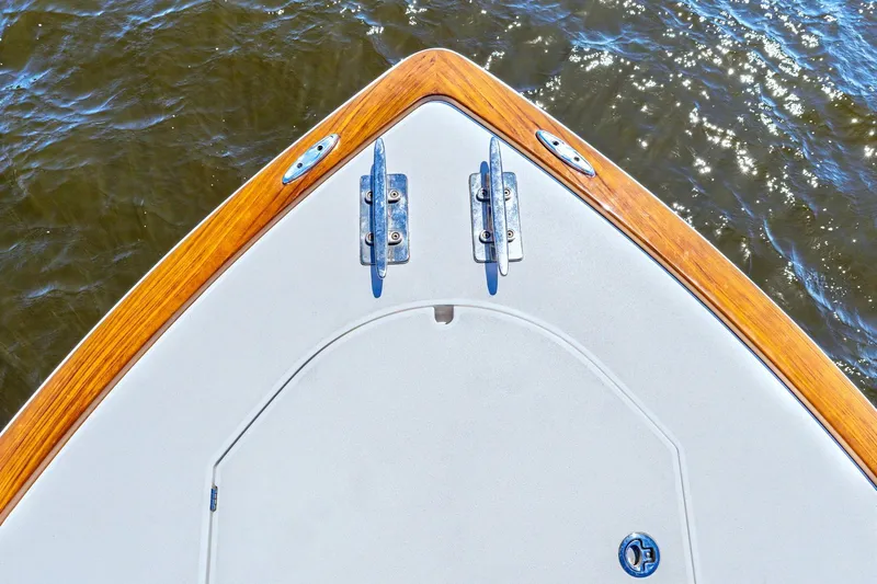 Slide: The Image of Bow of 2021 Valhalla Boatworks V-41 with teak accents on water. - 5