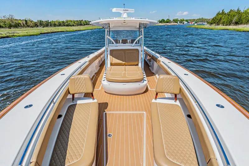 Slide: The Image of 2021 Valhalla Boatworks V-41 on water, featuring luxurious seating and sleek design. - 8