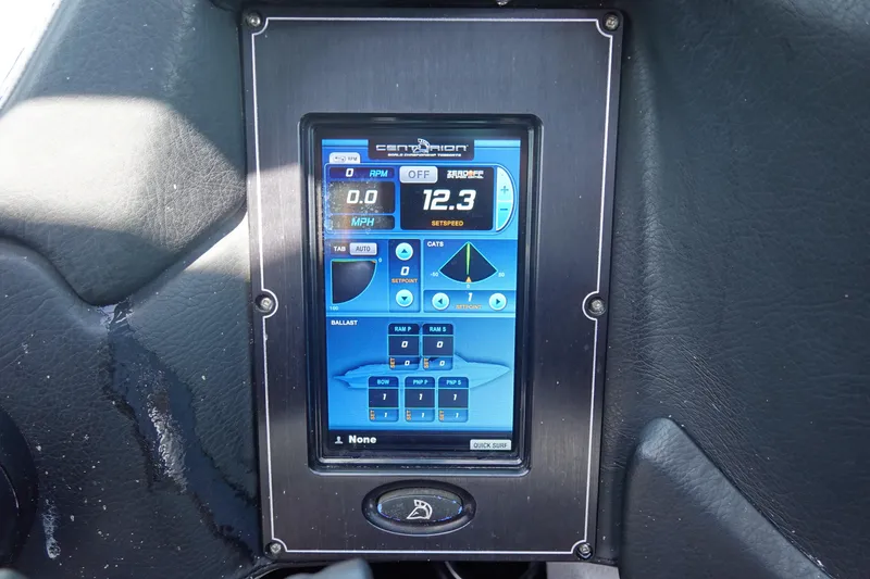 Slide: The Image of Touchscreen control panel of a 2016 Centurion Enzo FS33 boat displaying speed and settings. - 12