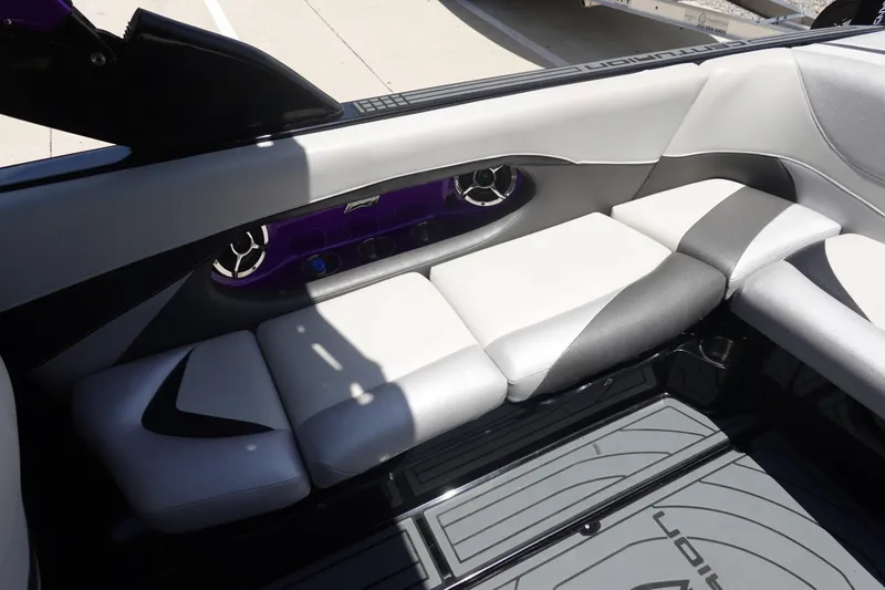 Slide: The Image of 2016 Centurion Enzo FS33 boat interior with stylish seating and speaker system. - 16