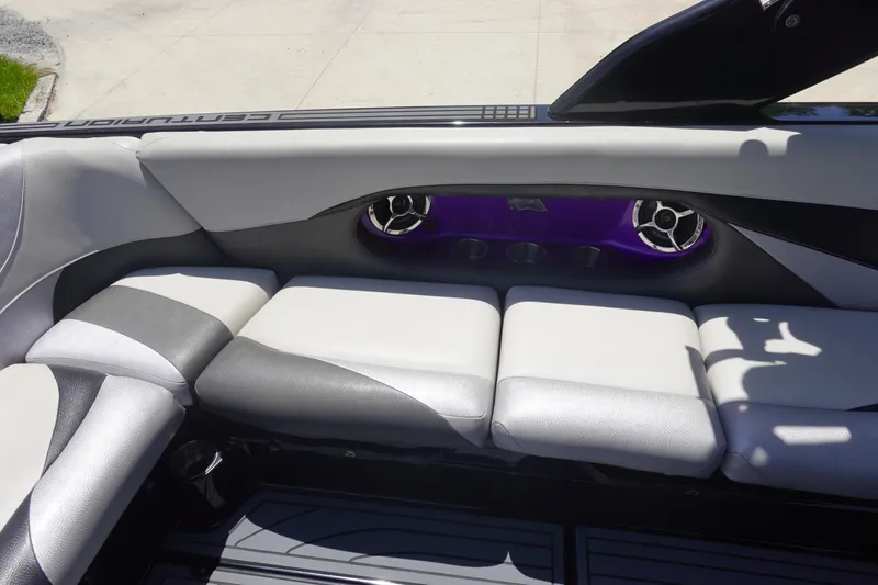 Slide: The Image of 2016 Centurion Enzo FS33 boat interior with gray and black seating. - 18