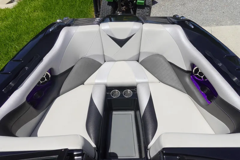 Slide: The Image of Luxurious interior of 2016 Centurion Enzo FS33 boat with stylish seating and cup holders. - 25