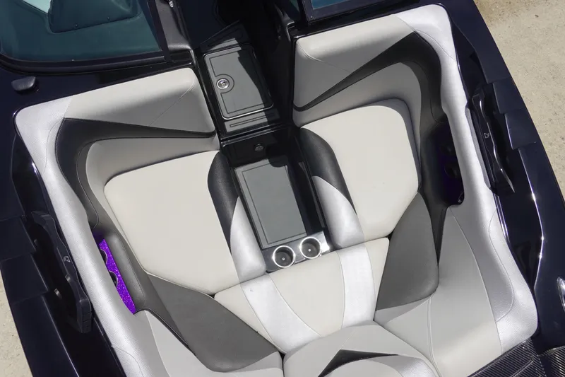 Slide: The Image of 2016 Centurion Enzo FS33 boat interior with modern seating and sleek design. - 26
