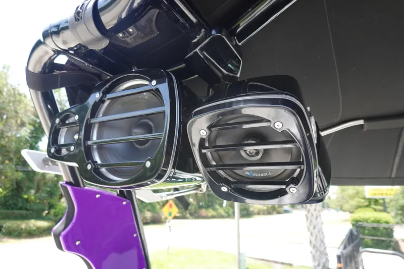 Slide: The Image of 2016 Centurion Enzo FS33 boat speakers, mounted under a black canopy. - 31