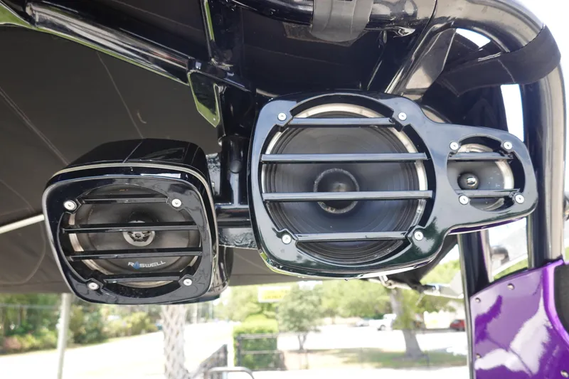 Slide: The Image of Speakers mounted on a 2016 Centurion Enzo FS33 boat, featuring Roswell audio equipment. - 32