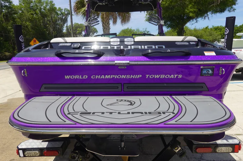 Slide: The Image of 2016 Centurion Enzo FS33 boat, purple, labeled "World Championship Towboats," rear view. - 5