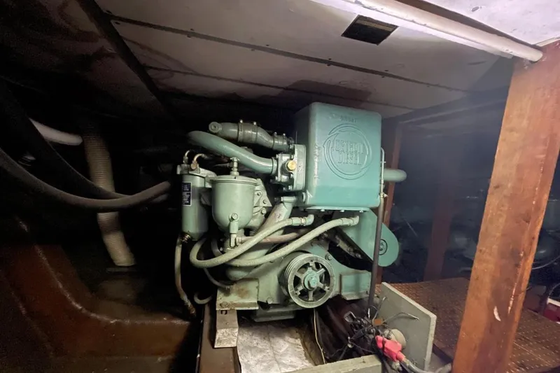Slide: The Image of 1973 Chris-Craft 45 Commander engine room with vintage diesel engine. - 15
