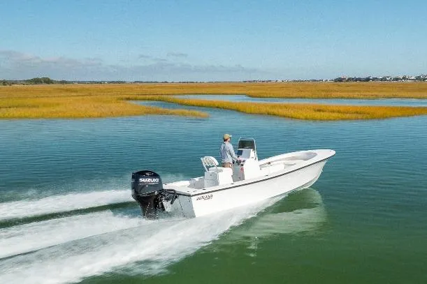Slide: The Image of Privateer ROAMER II 2026 boat cruising on calm waters. - 3