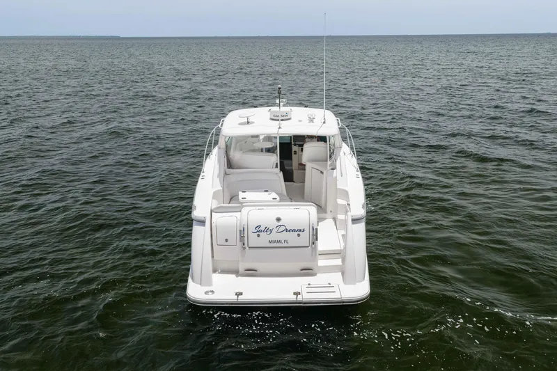 Slide: The Image of 2010 Tiara Yachts 3500 Sovran LE on open water, rear view. - 15