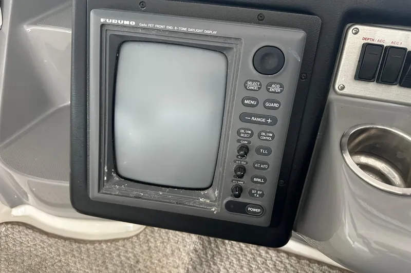 Slide: The Image of Furuno marine display on 2005 Cruisers Yachts 400 Express dashboard. - 14