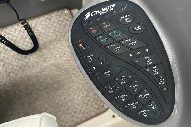 Slide: The Image of Control panel of a 2005 Cruisers Yachts 400 Express boat. - 16