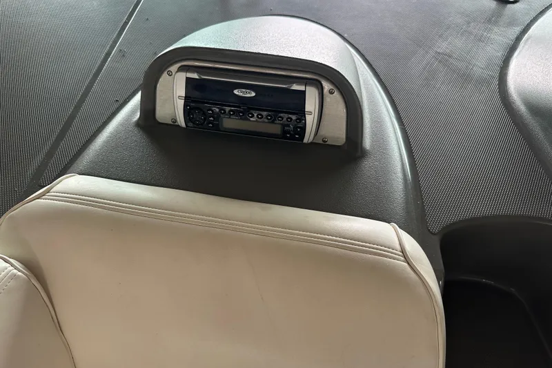 Slide: The Image of 2005 Cruisers Yachts 400 Express dashboard with Clarion stereo system. - 17