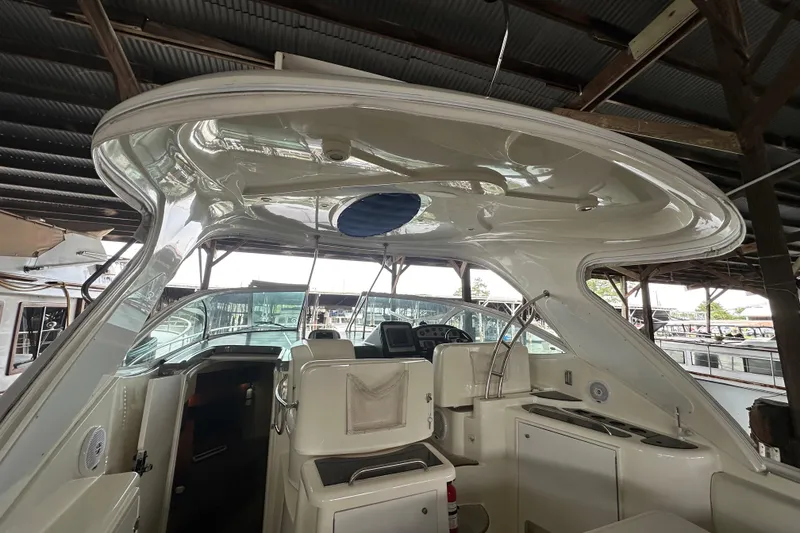 Slide: The Image of 2005 Cruisers Yachts 400 Express interior view under covered dock. - 22