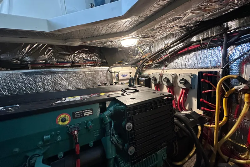 Slide: The Image of Engine room of 2005 Cruisers Yachts 400 Express with Volvo Penta components. - 30