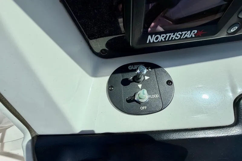Slide: The Image of Control panel of a 2008 Sea Ray 300 SLX boat with Northstar navigation system. - 17