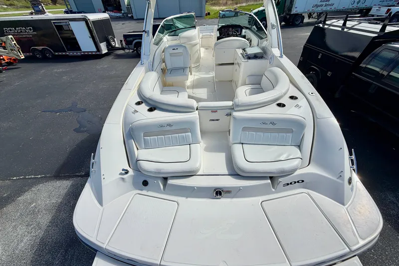Slide: The Image of 2008 Sea Ray 300 SLX boat with spacious seating and sleek design. - 2