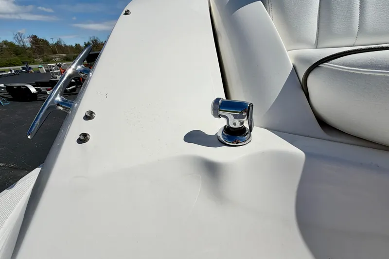 Slide: The Image of 2008 Sea Ray 300 SLX boat detail with chrome fittings and white seating. - 28