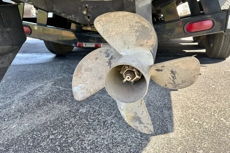 Slide: The Image of Propeller of a 2008 Sea Ray 300 SLX boat on a trailer. - 29