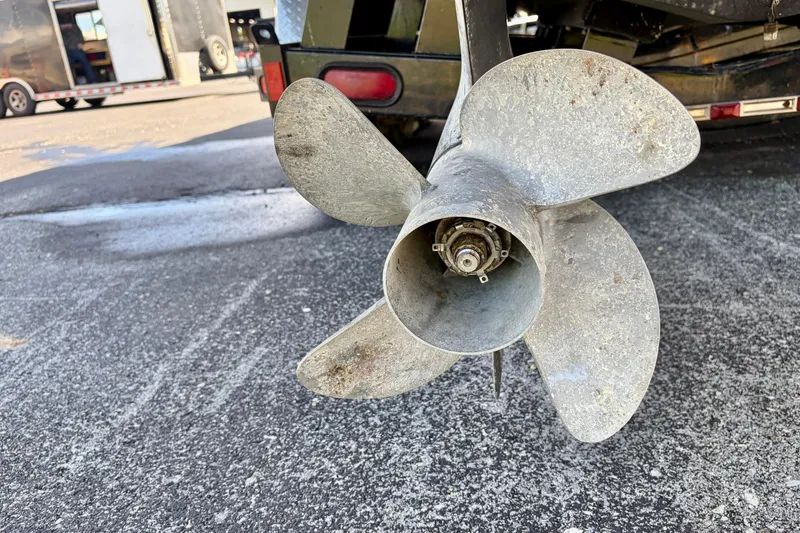 Slide: The Image of Propeller of a 2008 Sea Ray 300 SLX boat on a trailer. - 30
