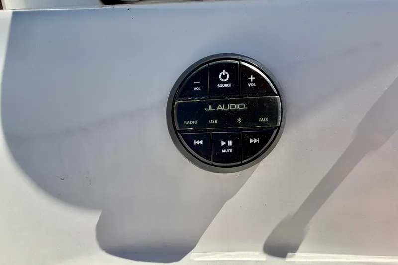 Slide: The Image of JL Audio control panel on a 2008 Sea Ray 300 SLX boat dashboard. - 36