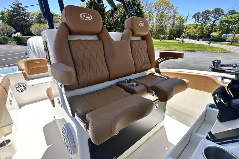 Slide: The Image of Luxurious seating on 2026 Key West 291 FS boat with brown leather upholstery. - 12