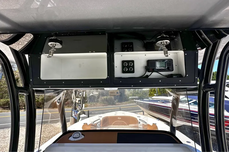 Slide: The Image of Interior view of a 2026 Key West 291 FS boat console with electronic controls. - 14