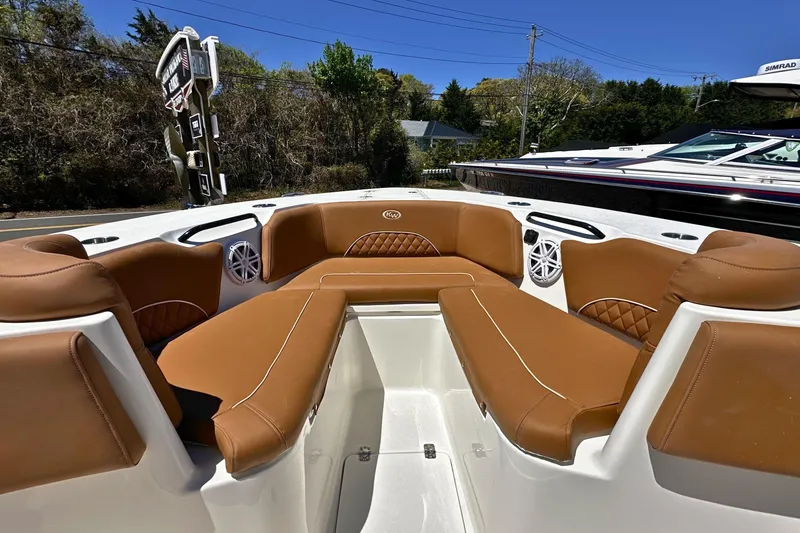 Slide: The Image of 2026 Key West 291 FS boat interior with tan leather seating and modern design. - 18