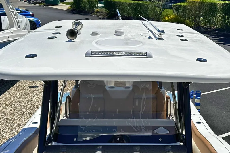 Slide: The Image of 2026 Key West 291 FS boat with sleek roof design and modern features. - 20