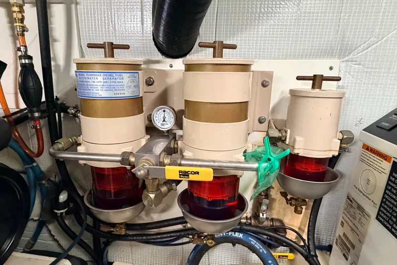 Slide: The Image of Fuel filter system in a 2002 American Tug 34 engine room. - 53
