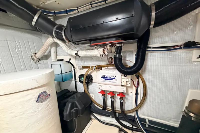 Slide: The Image of Engine room of a 2002 American Tug 34 with Reverso oil change system. - 55