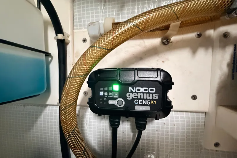 Slide: The Image of NOCO Genius GEN5X1 charger installed on 2002 American Tug 34 boat. - 57