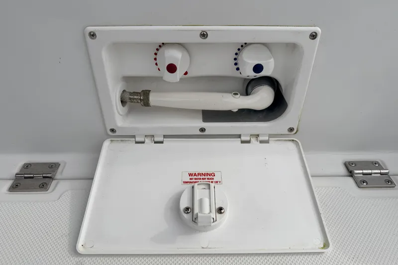 Slide: The Image of Exterior shower compartment on a 2002 American Tug 34 boat with temperature controls. - 82