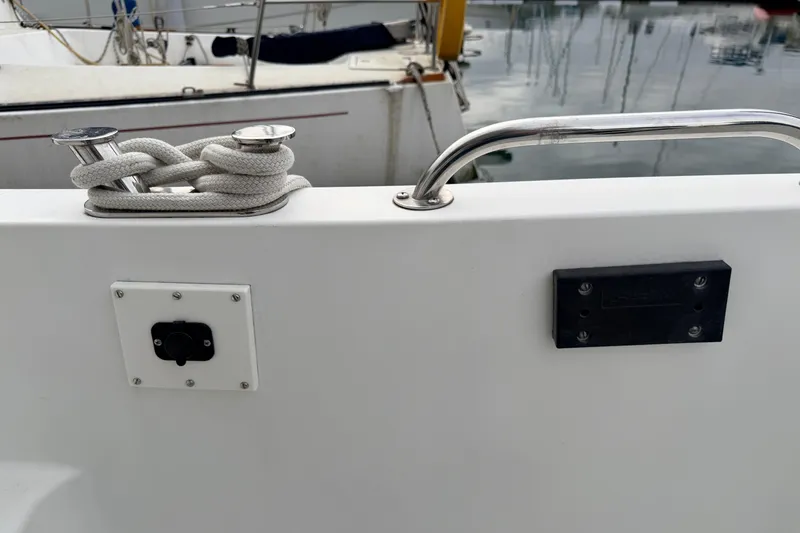 Slide: The Image of Deck of 2002 American Tug 34 with cleat, rope, and railing. - 84