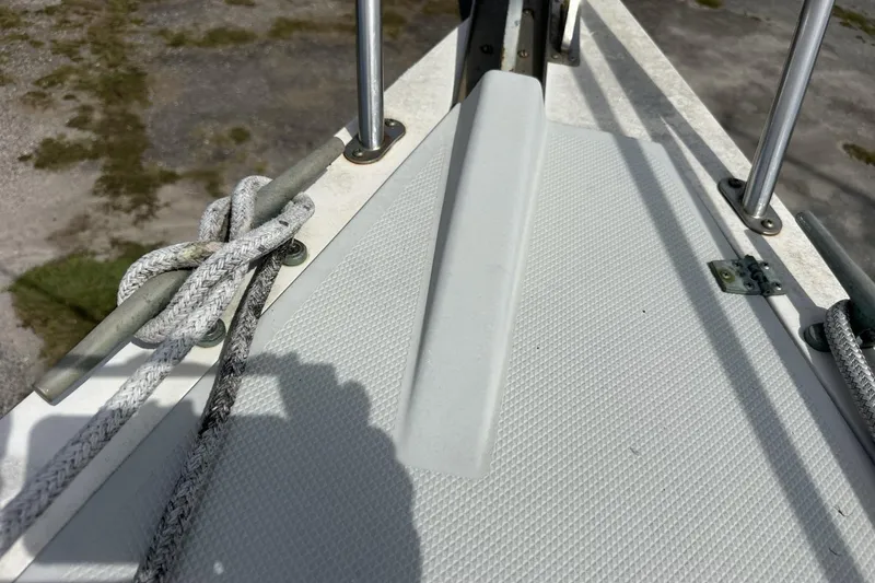 Slide: The Image of Deck of 1991 Catalina 42 sailboat with ropes and fittings. - 105