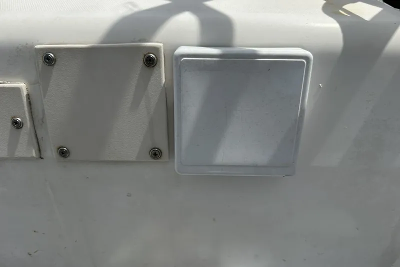 Slide: The Image of Close-up of a 1991 Catalina 42 boat's deck with mounted panels. - 131