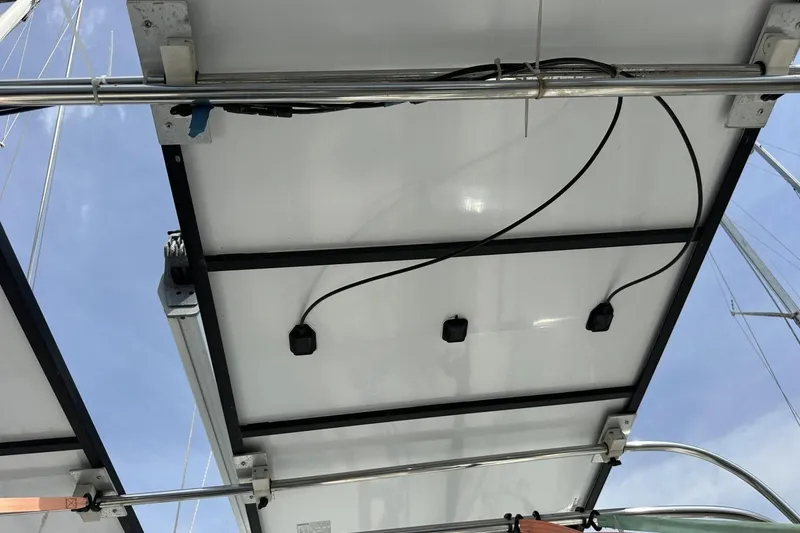 Slide: The Image of Solar panels installed on a 1991 Catalina 42 sailboat, viewed from below. - 132