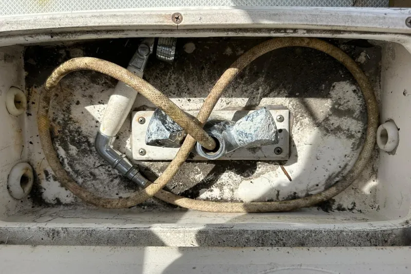 Slide: The Image of Weathered boat plumbing system on a 1991 Catalina 42 sailboat. - 147