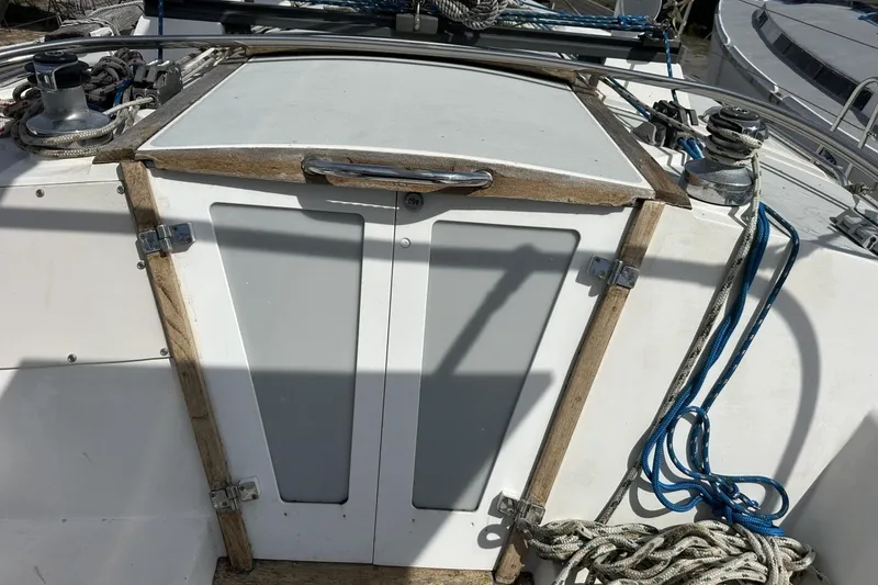 Slide: The Image of Cockpit of a 1991 Catalina 42 sailboat with ropes and winches. - 149