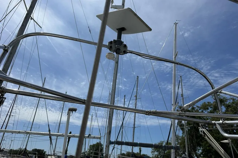 Slide: The Image of Sailboat rigging and masts under a clear blue sky, Catalina 42, 1991 model. - 15