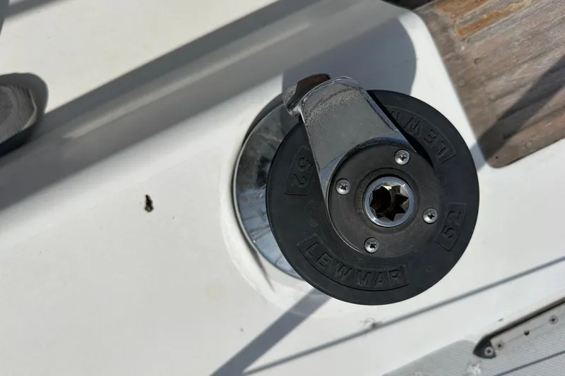 Slide: The Image of Winch on 1991 Catalina 42 sailboat deck, featuring Lewmar 52 model. - 154
