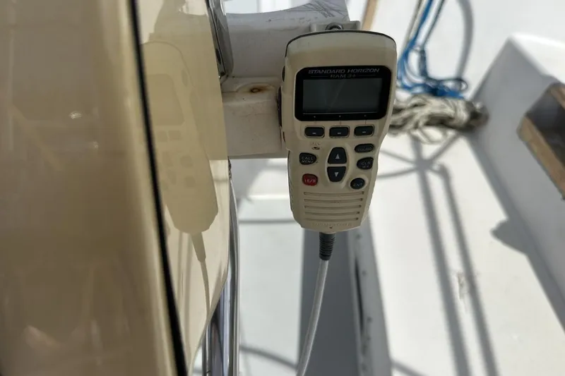 Slide: The Image of VHF radio on a 1991 Catalina 42 sailboat, mounted on the deck. - 160
