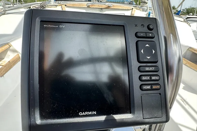 Slide: The Image of Garmin echomap DV on 1991 Catalina 42 sailboat, featuring navigation controls and display. - 162