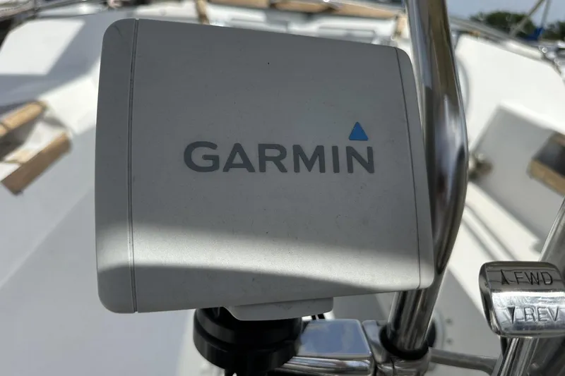 Slide: The Image of Garmin device on a 1991 Catalina 42 yacht's steering console. - 163