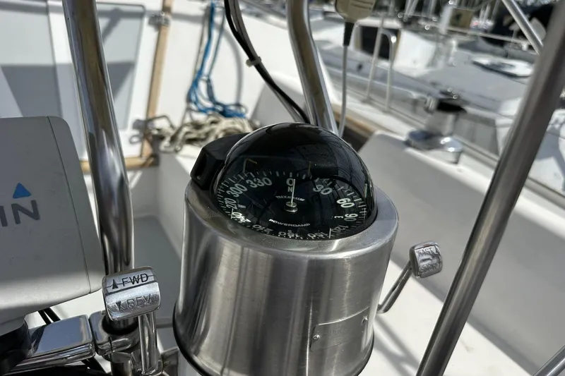 Slide: The Image of Compass on a 1991 Catalina 42 sailboat, showing navigation details. - 165