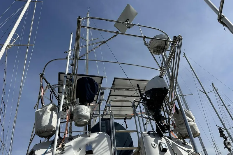 Slide: The Image of Sailboat rigging and equipment on a 1991 Catalina 42 under a clear blue sky. - 185
