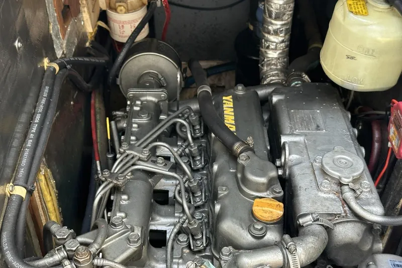 Slide: The Image of Engine compartment of a 1991 Catalina 42 sailboat with Yanmar diesel engine. - 24